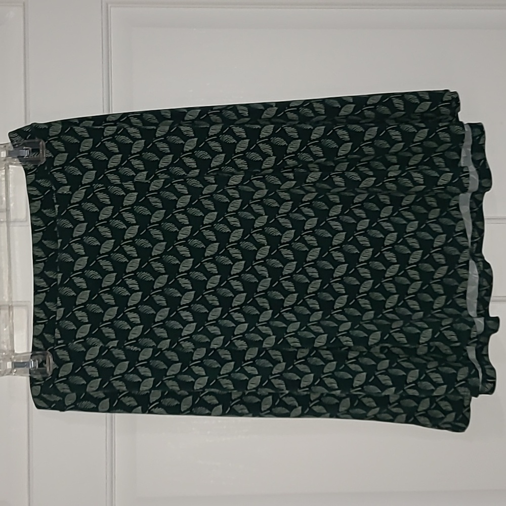 Green and black patterned skirt